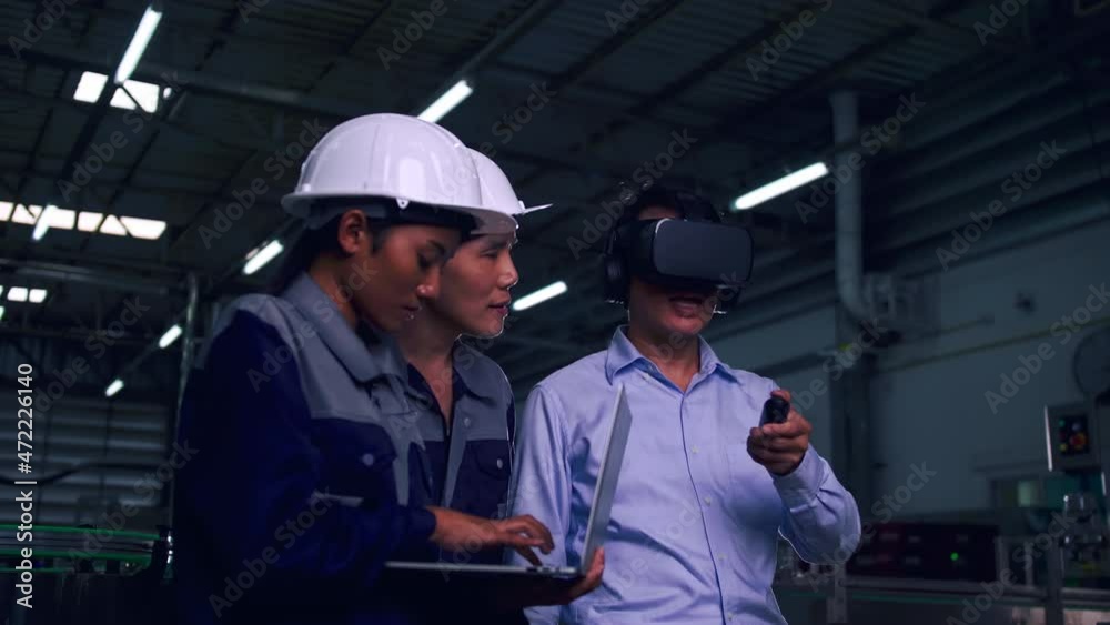 A team of engineers is explaining remote machine control to industrial owners. A team of engineers is explaining remote machine control to industrial owners.