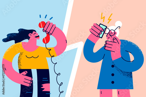 Happy young and old woman talk on phone 