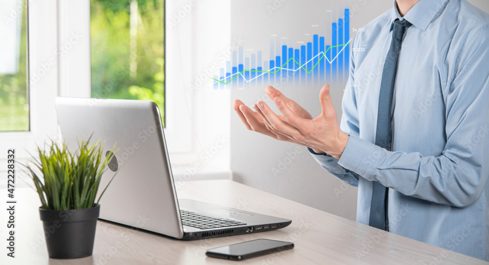 Business man holding tablet and showing holographic graphs and stock market statistics gain profits. Concept of growth planning and business strategy. Display of good economy form digital screen. Business man holding tablet and showing holographic graphs and stock market statistics gain profits. Concept of growth planning and business strategy. Display of good economy form digital screen.
