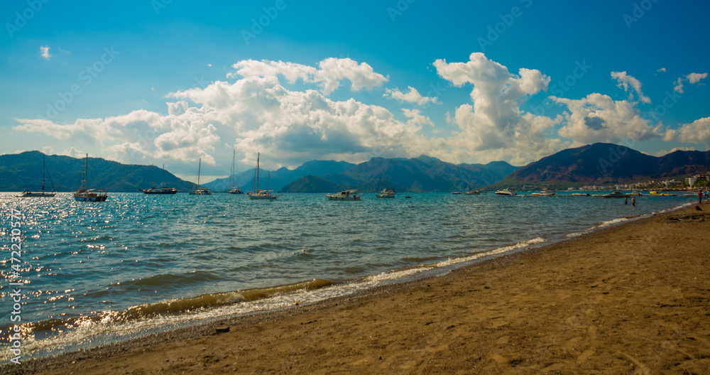 MARMARIS, TURKEY: Beautiful landscape with views of the beach, the Mediterranean sea and the mountains on a sunny day.