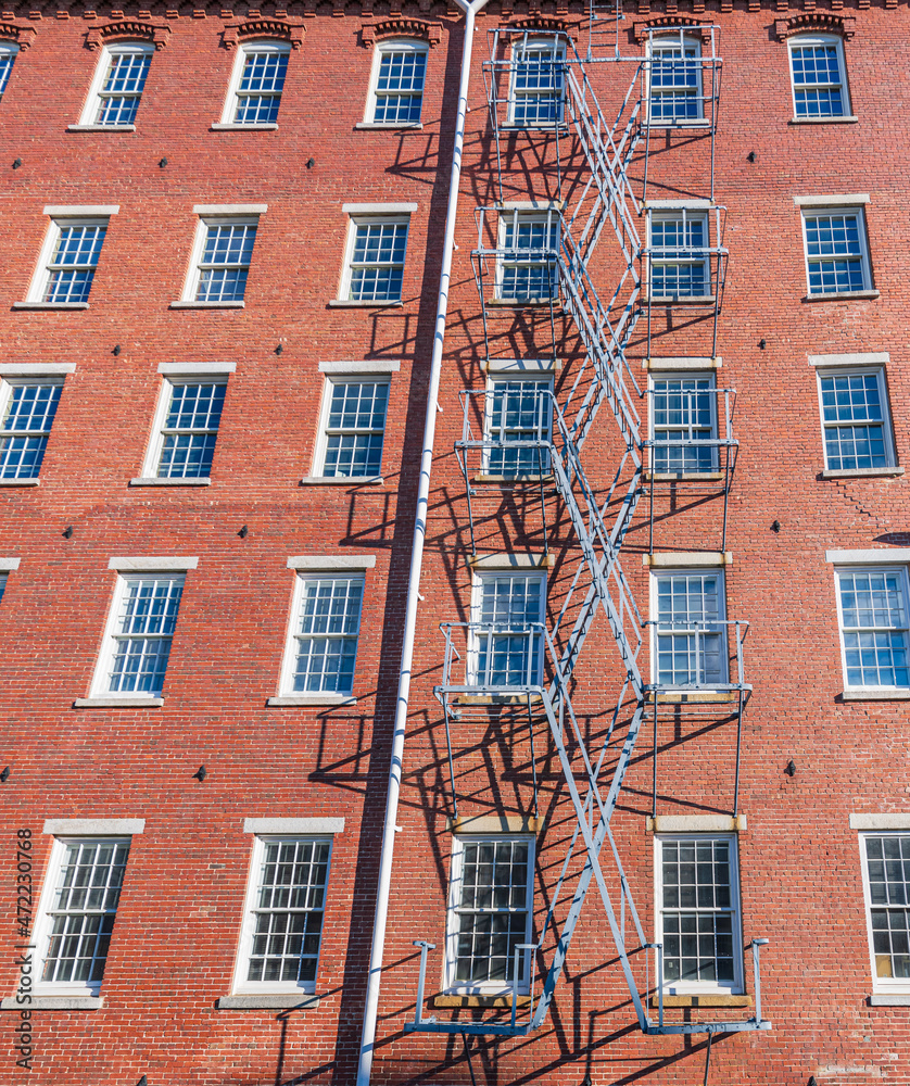 Fototapeta premium Old mill New England mill building fire escape