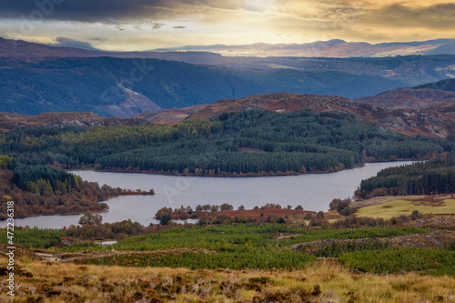 Panoramic view from the Suidhe viewpoint over the hills to Loch Tarff at the Scottish highlands during autumn time