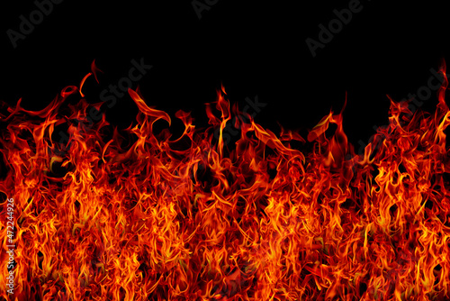 Violently burning orange flames on a black background.