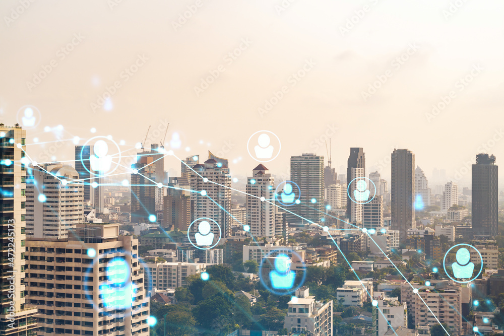 Obraz premium Social media icons hologram over panorama city view of Bangkok, Southeast Asia. The concept of people networking, connections and career opportunities. Double exposure.