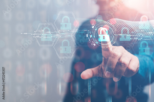 Photos cybersecurity concept Business man shows how to protect cyber technology network from attack by hackers on the internet
