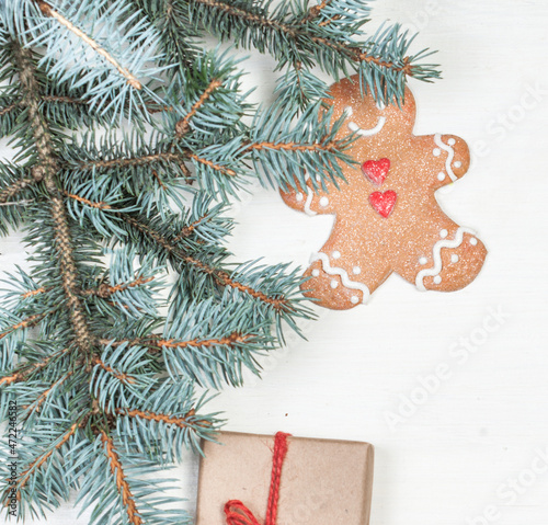 Christmas background with holiday decoration elements, presents and fir tree branches on white wooden background. Christmas Flat lay