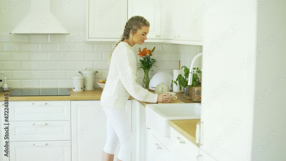 Young woman relaxing with tea at home. Young woman relaxing with tea at home.