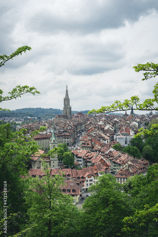 A view of Bern, Switzerland from the hill of Rosengarten (Rose Garden), with the red roofs of the city below - Aargauerstalden Viewpoint A view of Bern, Switzerland from the hill of Rosengarten (Rose Garden), with the red roofs of the city below - Aargauerstalden Viewpoint