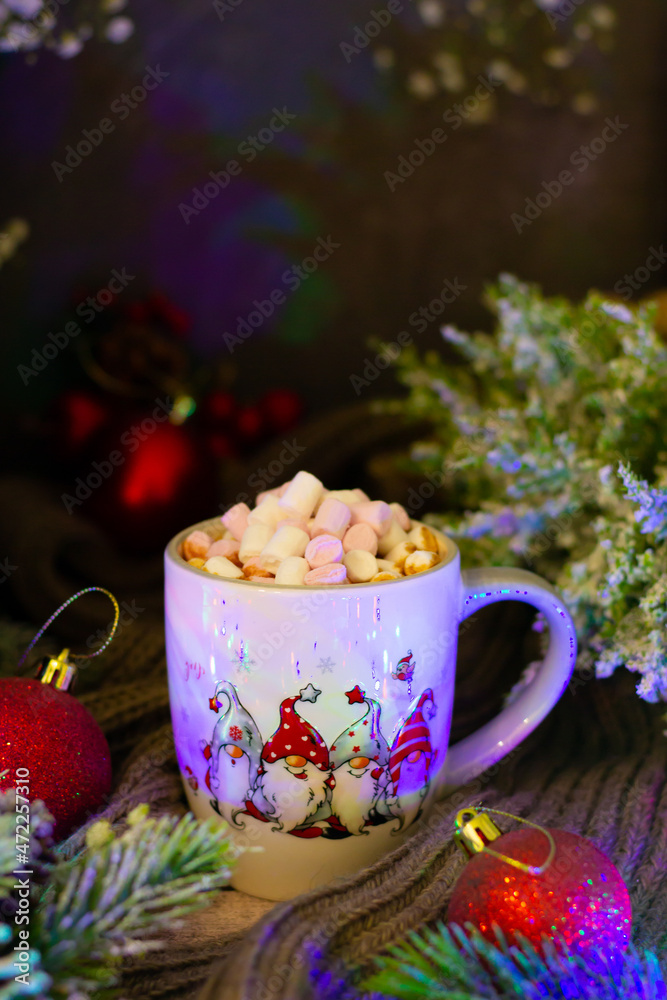 Fototapeta premium A delightful winter scene showcasing a cup brimming with hot chocolate, set on rustic wood with twinkling festive lights and ornaments.