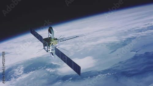 Weather, military or communications Satellite in earth orbit. Planet surface slowly moving in the background.
