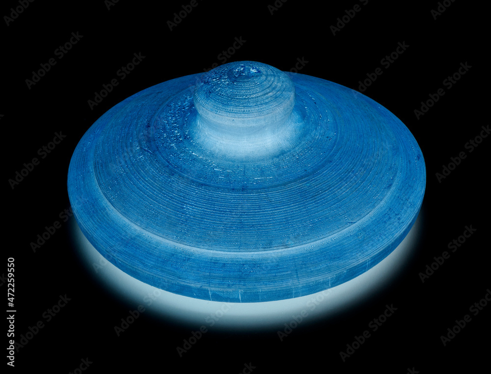 Round blue wooden carved lid isolated on black background Round blue wooden carved lid isolated on black background