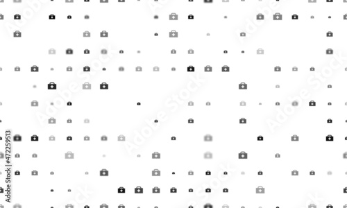 Seamless background pattern of evenly spaced black first aid symbols of different sizes and opacity. Vector illustration on white background
