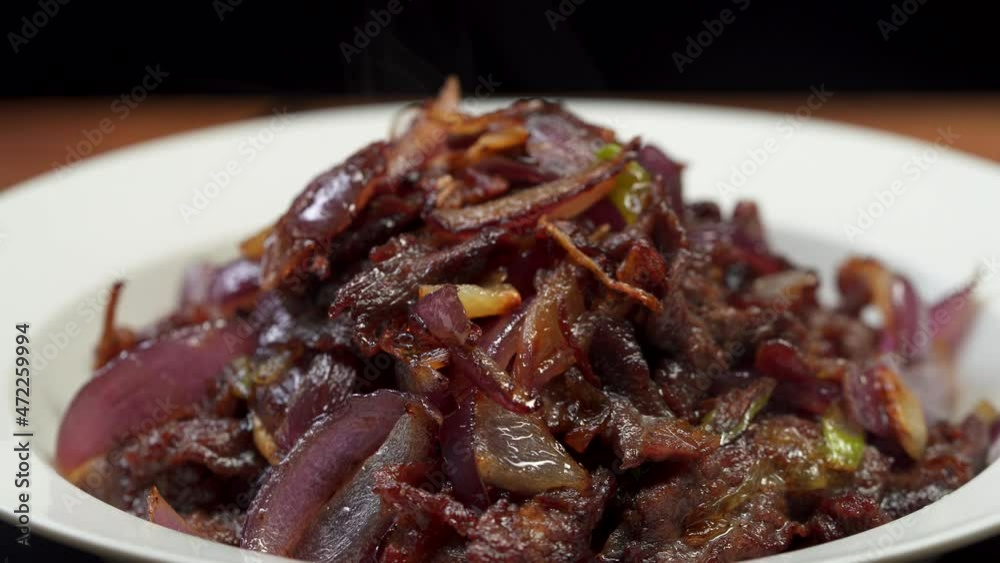 Chinese home-cooked side dishes, fried beef with onion Chinese home-cooked side dishes, fried beef with onion