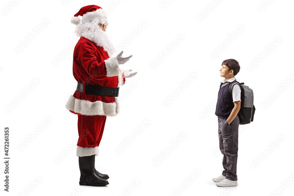 Sanyta cluas talking to a boy carrying a backpack and wearing a school uniform