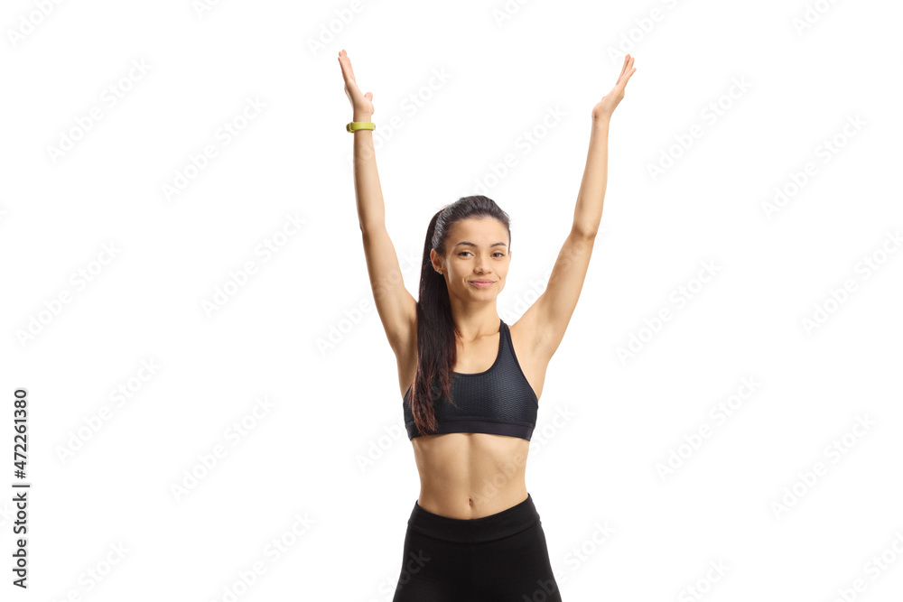 Young female in black crop top stretching arms Young female in black crop top stretching arms