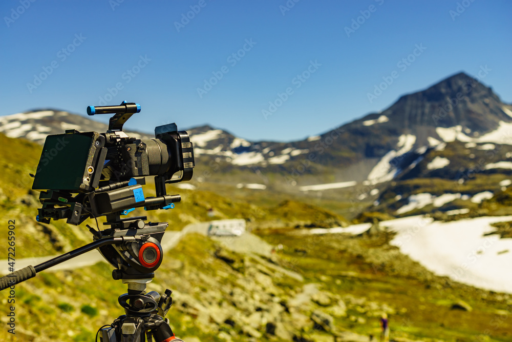 Camera taking photo in mountains, Norway Camera taking photo in mountains, Norway
