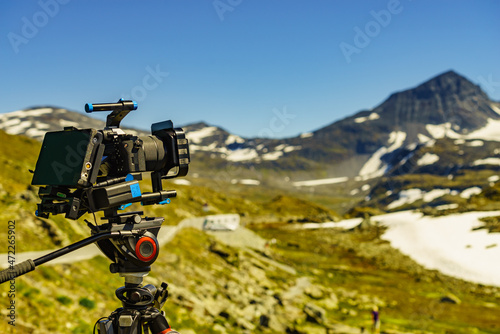 Camera taking photo in mountains, Norway