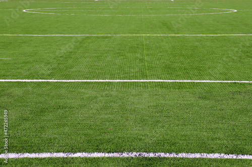 Soccer field with lines. Green grass texture