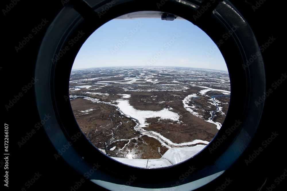 spring tundra in the porthole