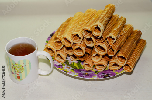 fresh waffles for tea rolled into a tube