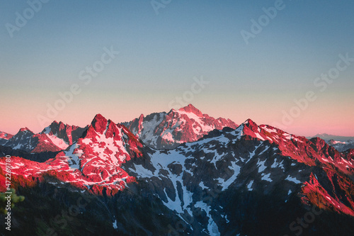 A beautiful sunset over mountains in North Cascades photo