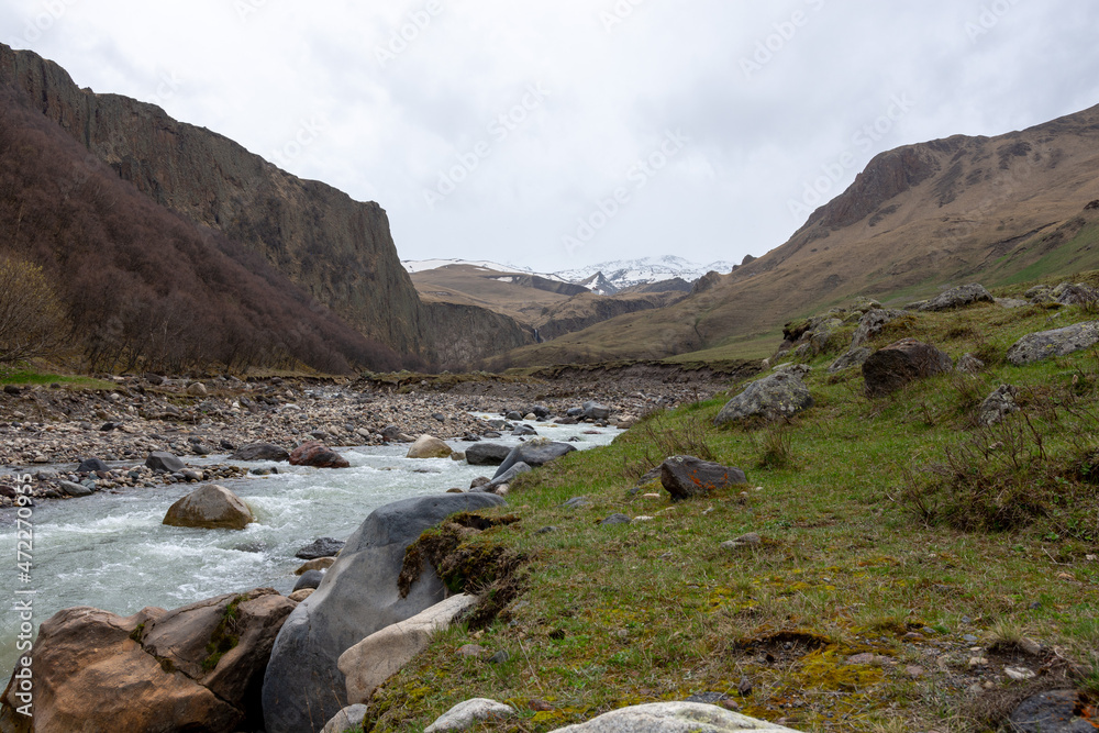 view of a winding mountain river view of a winding mountain river