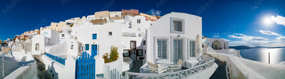 Fototapeta premium Panorama if Oia. Santorini island. Oia ( Ia ) is a small town in the Aegean islands of Thira ( Santorini ) and Therasia, in the Cyclades, Greece.