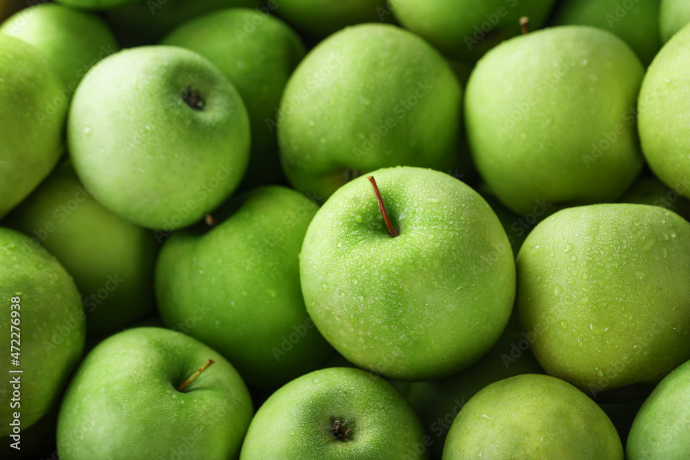 Background of ripe and juicy green apples, perspective from above. Background of ripe and juicy green apples, perspective from above.