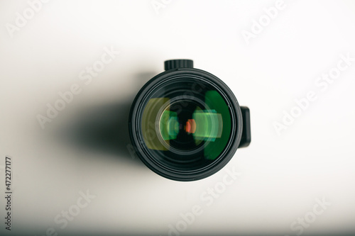 Top view of dslr camera zoom lens isolated on white background