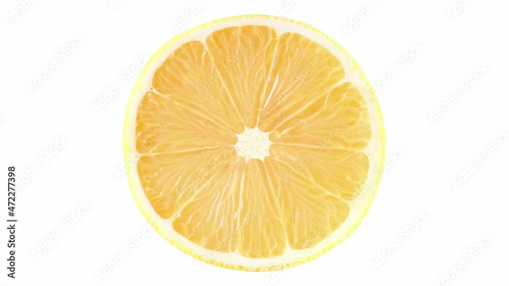 Lemon yellow, citrus fruit cut middle close-up, rotating isolated on white, macro, topview. Lemon yellow, citrus fruit cut middle close-up, rotating isolated on white, macro, topview.