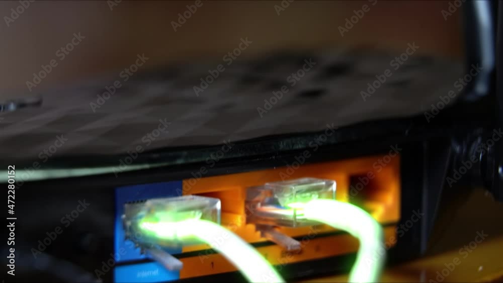 Ethernet Cables, Connected To Modem, With Digital Binary Code ,Streaming Data