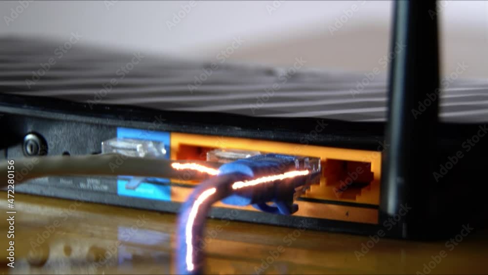Ethernet Cables Connected To Modem With Digital Binary Code Streaming Data Ethernet Cables Connected To Modem With Digital Binary Code Streaming Data