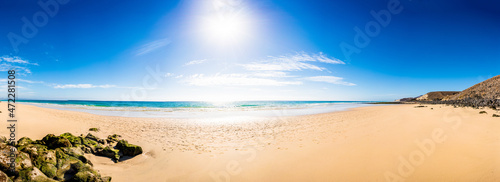 Fototapeta Naklejka Na Ścianę i Meble -  Panorama of a sandy beach with stones in the Canary Islands