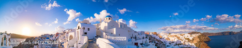 White houses in the town of Oia on the island of Santorini, panorama photo