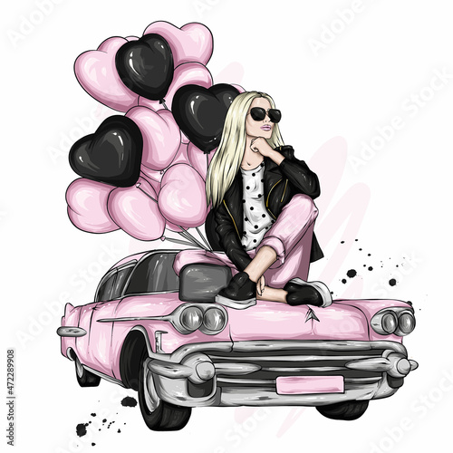 A beautiful girl in stylish clothes, balloons in the shape of hearts and a retro car. Valentine's Day. Fashion & Style.