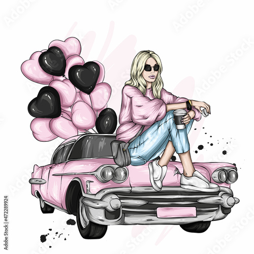 A beautiful girl in stylish clothes, balloons in the shape of hearts and a retro car. Valentine's Day. Fashion & Style.