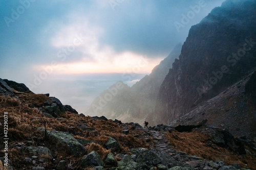 Fototapeta Naklejka Na Ścianę i Meble -  Tiny hiker silhouette in big Tatra mountains