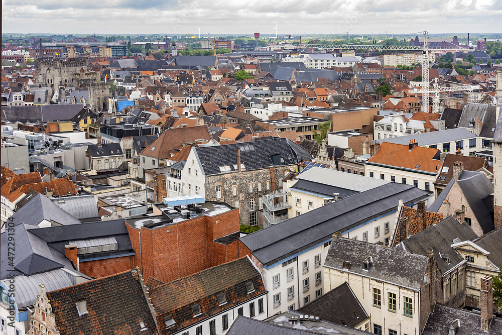 Aerial view of Ghent from Belfry - roofs and beautiful medieval buildings. Ghent is a city and a municipality located in the Flemish region of Belgium. Ghent, Belgium.