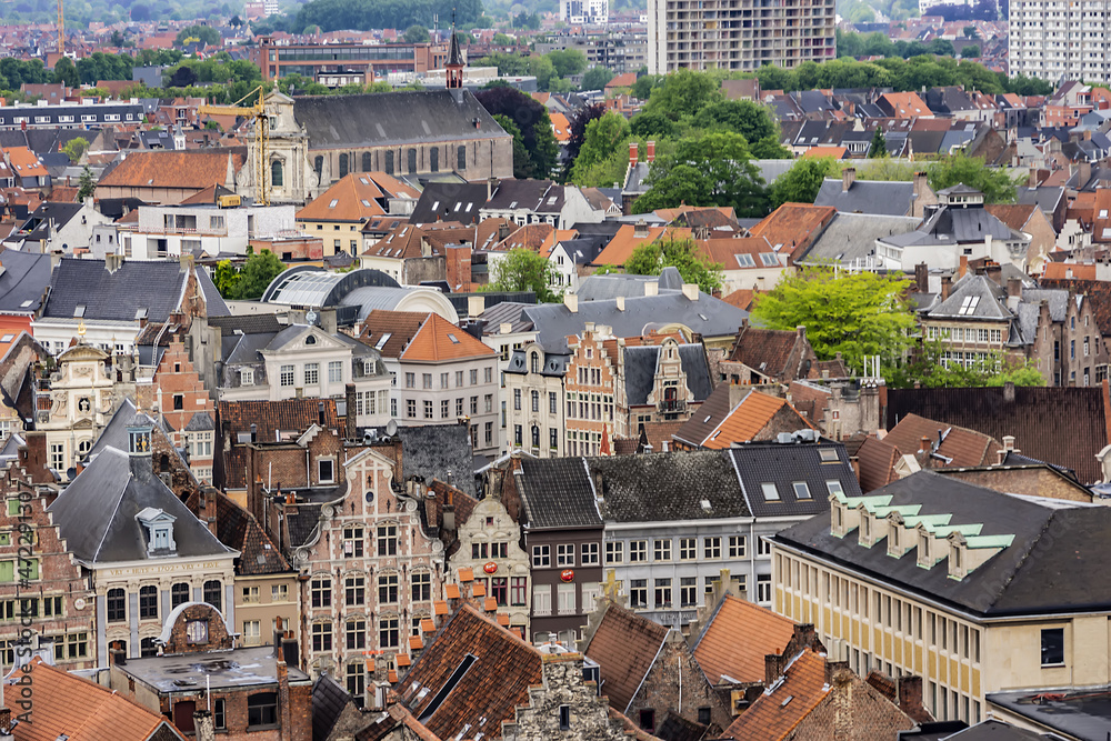 Aerial view of Ghent from Belfry - roofs and beautiful medieval buildings. Ghent is a city and a municipality located in the Flemish region of Belgium. Ghent, Belgium.