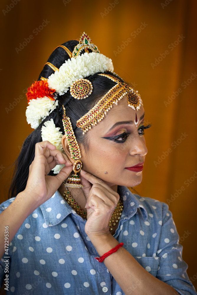 Indian classical dancer getting ready 