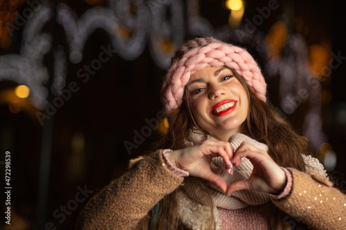 Stunning lady showing heart sign