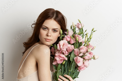 pretty woman pink flower bouquet fashion summer light background