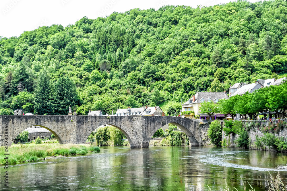 The Gothic bridge of Estaing is listed as a UNESCO World Heritage Site as part of the Peligrims Route to Santiago de Compostela. Many pilgrims still walk across the bridge every year.