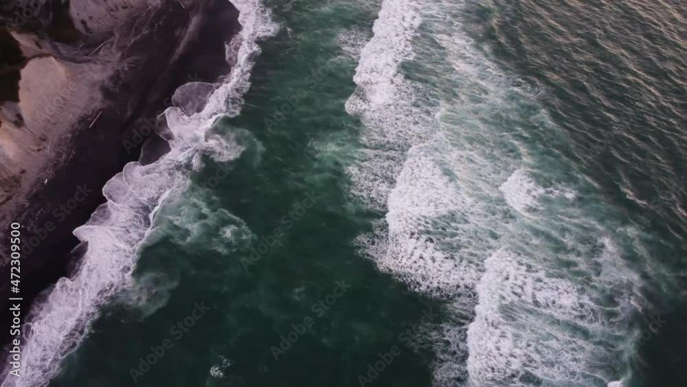 Cape Stolbchaty on the island of Kunashir, Kuril Islands, a unique geological volcanic formation included in UNESCO list. Aerial view. Cape Stolbchaty on the island of Kunashir, Kuril Islands, a unique geological volcanic formation included in UNESCO list. Aerial view.