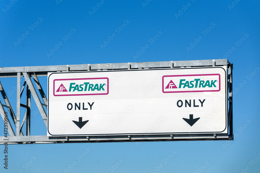 FasTrak Only express lane road sign. FasTrak is an electronic toll