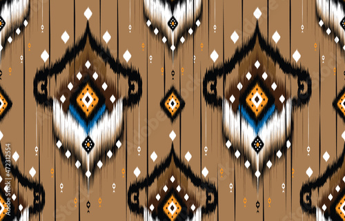 Ikat geometric folklore ornament with diamonds. Tribal ethnic 
vector texture. Seamless striped pattern in Aztec style. Folk embroidery. 
Indian, Scandinavian, Gypsy, Mexican, African rug.