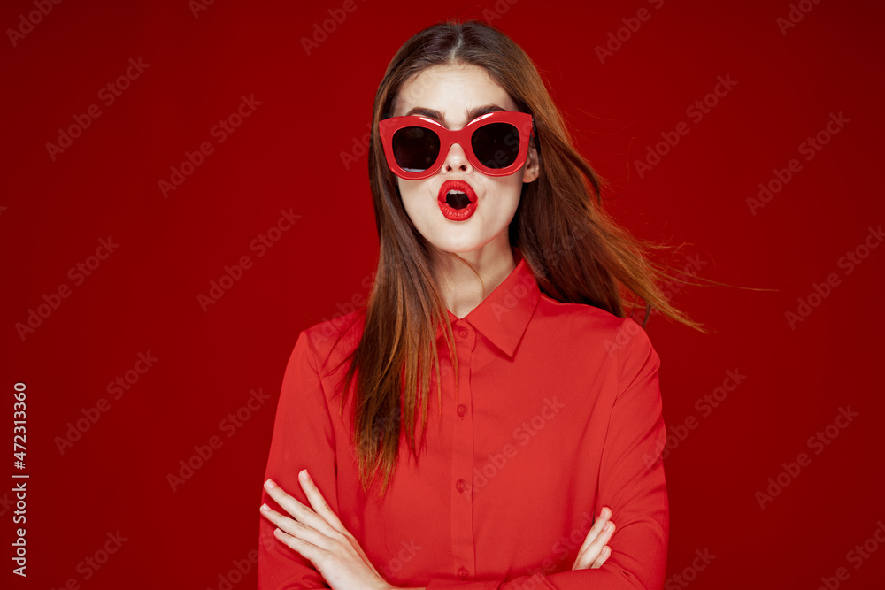 beautiful woman wearing sunglasses red shirt makeup isolated background beautiful woman wearing sunglasses red shirt makeup isolated background