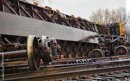 Tableau sur toile up close of a derailed train car after a wreck on a rainy day