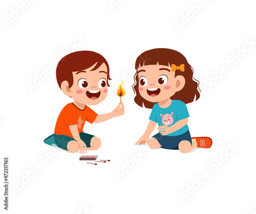 cute little boy and girl holding match stick with fire