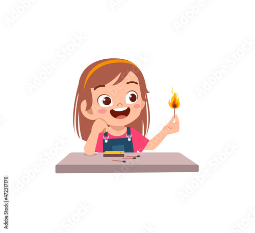 cute little girl holding match stick with fire